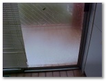 Hail on the balcony.